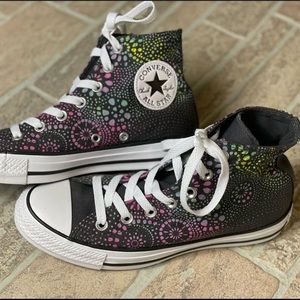 Woman’s Chuck Taylor Converse Multi colored Size 7 high top shoes